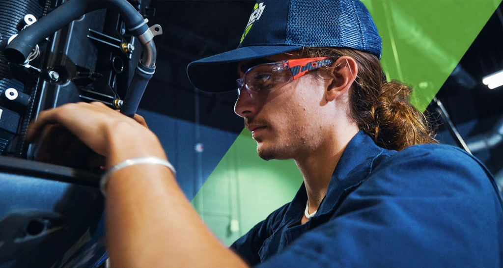 Marine technician working on a boat.